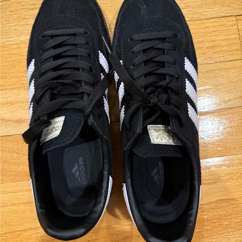 Adidas women’s Black and White Sneakers